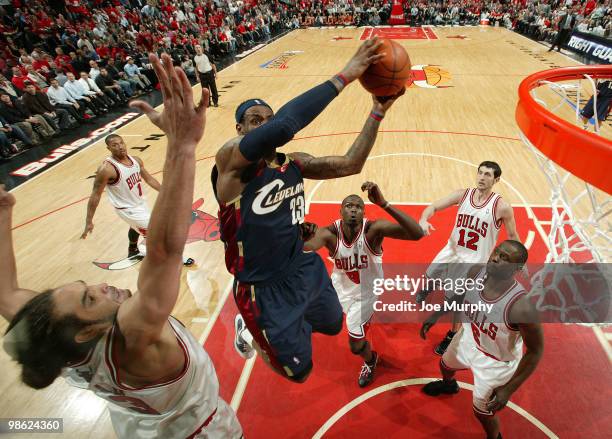 LeBron James of the Cleveland Cavaliers goes to the basket in Game Three of the Eastern Conference Quarterfinals against the Chicago Bulls during the...