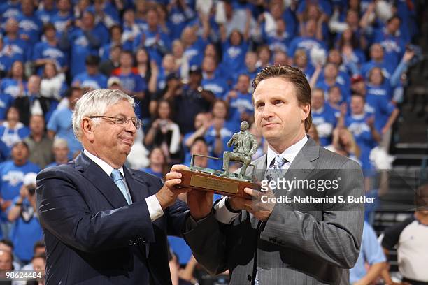 Commissioner David Stern gives the Coach of the Year award to Scott Brooks of the Oklahoma City Thunder before playing against the Los Angeles Lakers...