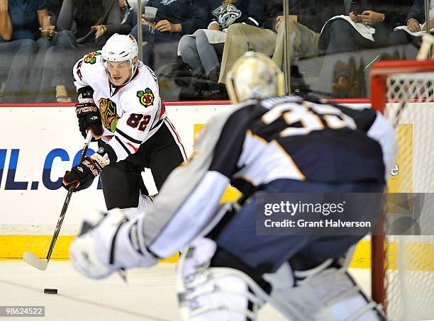 Tomas Kopecky of the Chicago Blackhawks takes shot against goalkeeper Pekka Rinne of the Nashville Predators in Game Four of the Eastern Conference...