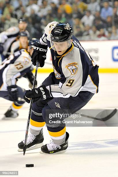 Marcel Goc of the Nashville Predators moves the puck against the Chicago Blackhawks in Game Four of the Eastern Conference Quarterfinals during the...