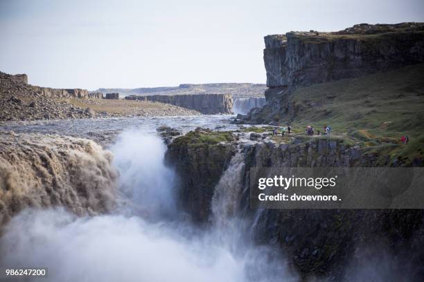 dettifoss waterfall in iceland at overcast weather - dettifoss waterfall foto e immagini stock