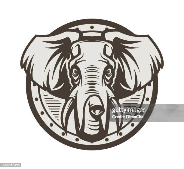 ilustraciones, imágenes clip art, dibujos animados e iconos de stock de cabeza de elefante en escudo - elephant face