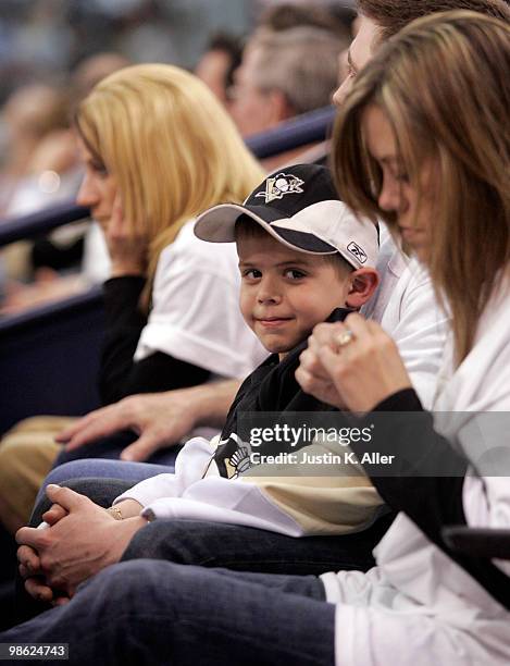 Young Pittsburgh Penguins fan stays up late during the second overtime period between the Pittsburgh Penguins and the Ottawa Senators in Game Five of...