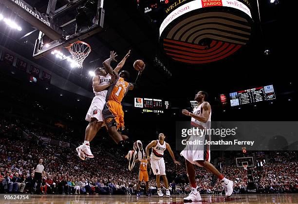 Amar'e Stoudemire of the Phoenix Suns shoots a basket against Andre Miller of the Portland Trail Blazers during Game 3 of the Western Conference...