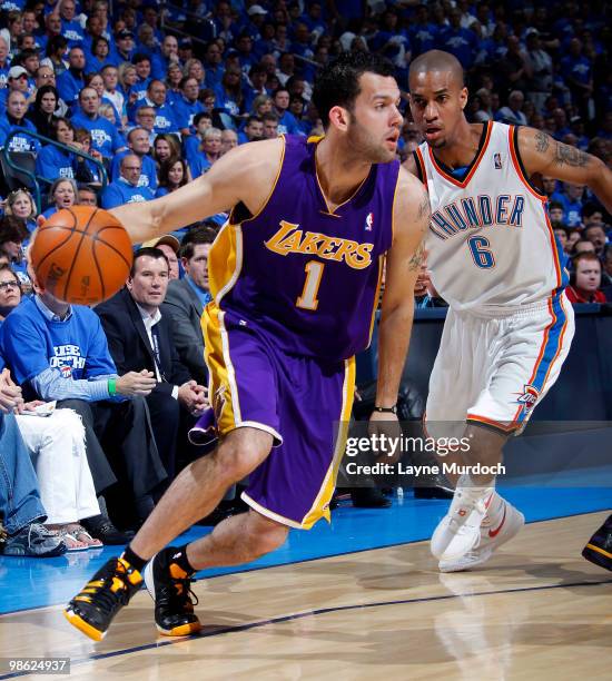 Jordan Farmar of the Los Angeles Lakers dribbles around Eric Maynor of the Oklahoma City Thunder in Game Three of the Western Conference...