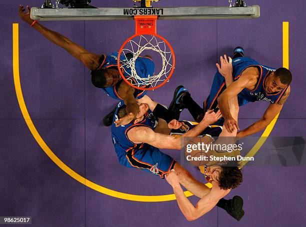 Pau Gasol of the Los Angeles Lakers fights for the ball with Serge Ibaka, Nick Collison, and Thabo Sefolosha of the Oklahoma City Thunder during Game...