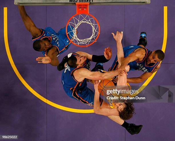 Pau Gasol of the Los Angeles Lakers fights for the ball with Serge Ibaka, Nick Collison, and Thabo Sefolosha of the Oklahoma City Thunder during Game...