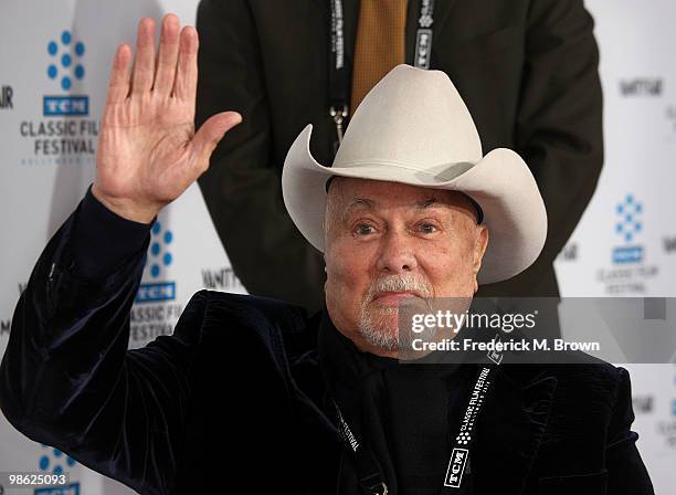 Actor Tony Curtis waves to photographers during the TCM Classic Film Festival screening of a "A Star Is Born" at Grauman's Chinese Theater on April...