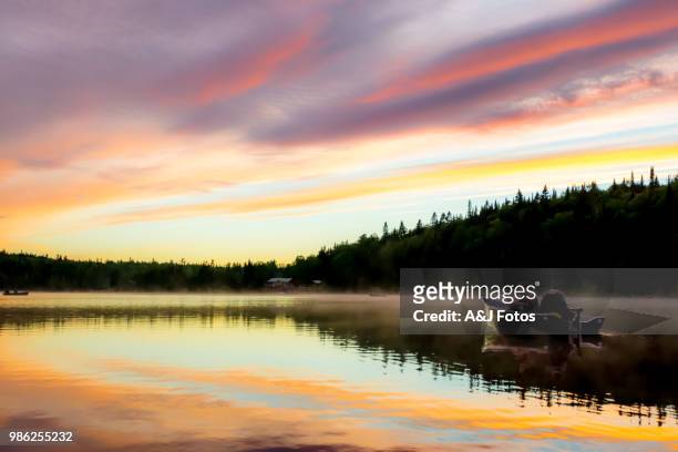 two fishermen on the lake - horizontal fotos stock pictures, royalty-free photos & images