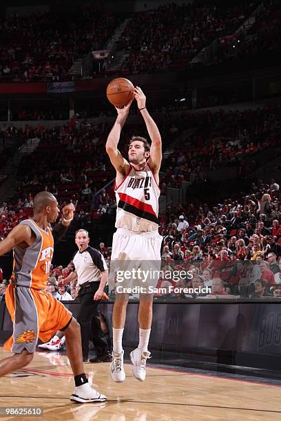 Rudy Fernandez of the Portland Trail Blazers takes a shot over Leandro Barbosa of the Phoenix Suns in Game Three of the Western Conference...