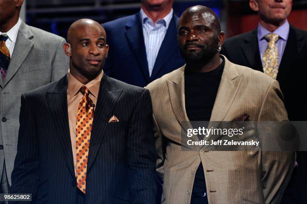 Former NFL Players Dieon Sanders and Lawrence Taylor stand on stage during the 2010 NFL Draft at Radio City Music Hall on April 22, 2010 in New York...