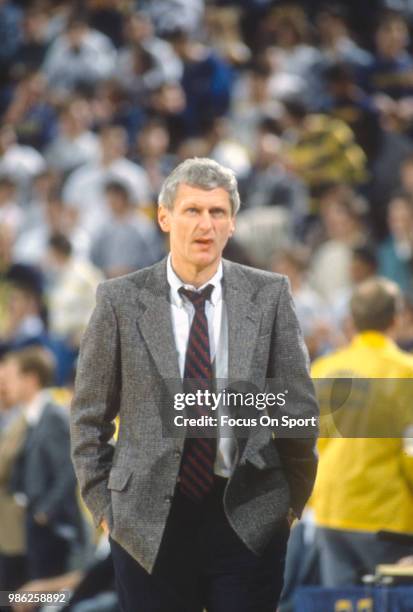 Head coach Bill Frieder of the University of Michigan looks on during an NCAA College basketball game circa 1988 at Crisler Arena in Ann Arbor,...