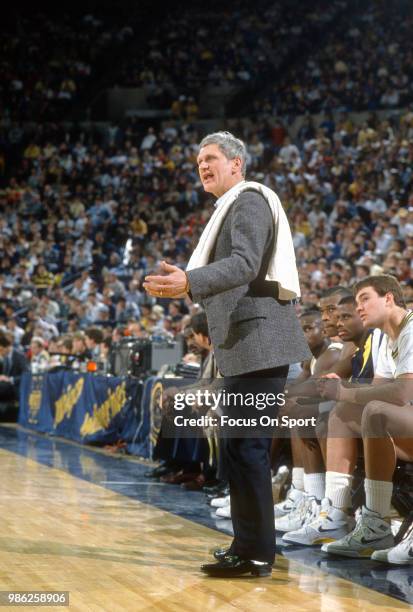 Head coach Bill Frieder of the University of Michigan looks on during an NCAA College basketball game circa 1988 at Crisler Arena in Ann Arbor,...