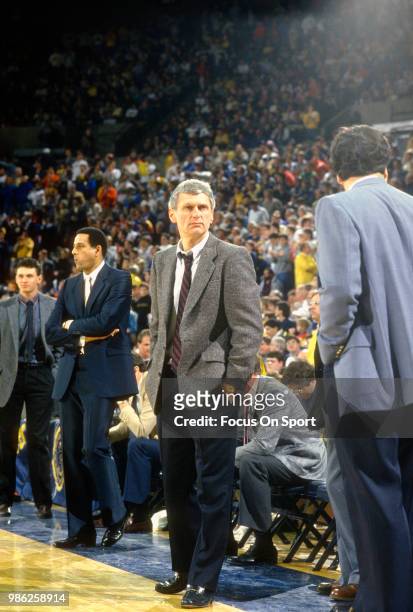 Head coach Bill Frieder of the University of Michigan looks on during an NCAA College basketball game circa 1988 at Crisler Arena in Ann Arbor,...