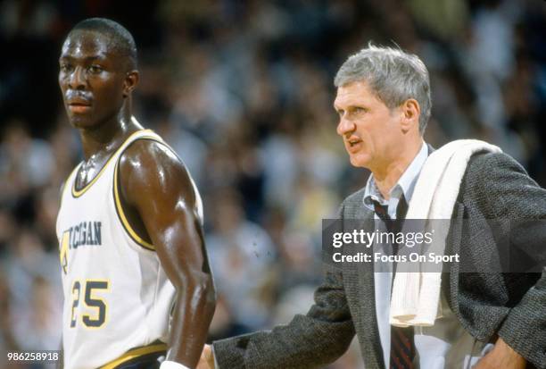 Head coach Bill Frieder of the University of Michigan looks on during an NCAA College basketball game circa 1988 at Crisler Arena in Ann Arbor,...