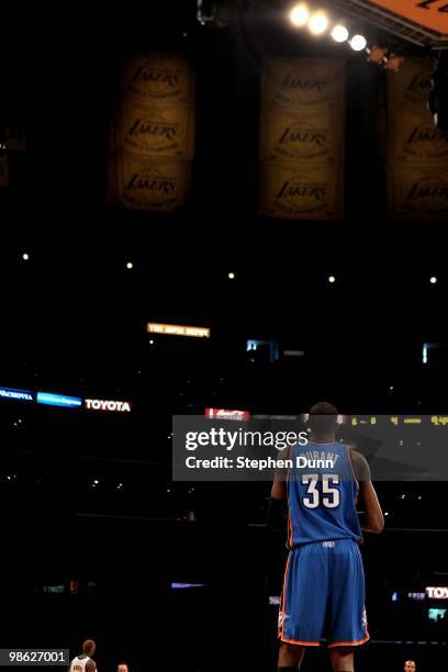 Kevin Durant of the Oklahoma City Thunder stands on the court beneath Los Angeles Lakers banners during Game One of the Western Conference...