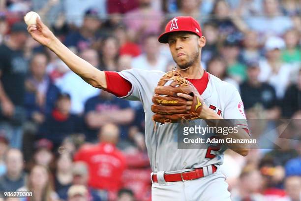 Andrelton Simmons of the Los Angeles Angels throws to first base in ethics's second dinning of a game against the Boston Red Sox at Fenway Park on...