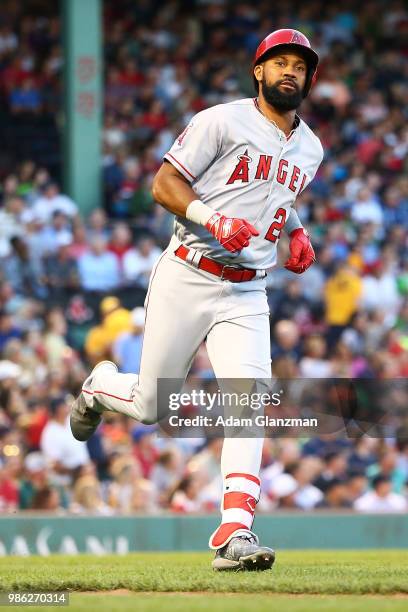 Chris Young of the Los Angeles Angels rounds the bases after hitting a solo home run in the third inning of a game against the Boston Red Sox at...