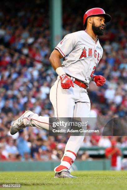 Chris Young of the Los Angeles Angels rounds the bases after hitting a solo home run in the third inning of a game against the Boston Red Sox at...