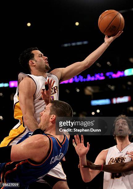 Jordan Farmer of the Los Angeles Lakers goes up for a shot against Nick Collison of the Oklahoma City Thunder during Game One of the Western...