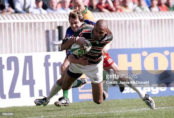 Leon Lloyd of Leicester goes over to score the winning try during the match between Stade Francais and Leicester Tigers in the Heineken Cup Final at...