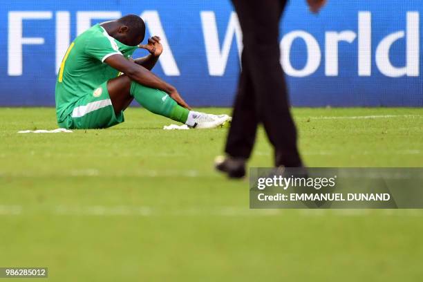 Senegal's forward Moussa Konate reacts at the end of the Russia 2018 World Cup Group H football match between Senegal and Colombia at the Samara...