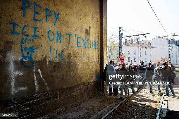 French railway company SNCF employees demonstrate on April 19, 2010 at the train station Gare Perrache in Lyon, eastern France, as they continue a...