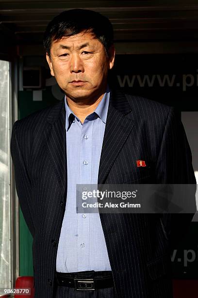 Head coach Kim Jong Hun of North Korea reacts before during the international friendly match between South Africa and North Korea at the Brita arena...