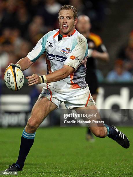 Meyer Bosman of the Cheetahs passes the ball out during the round 11 Super 14 match between the Chiefs and the Cheetahs at Waikato Stadium on April...