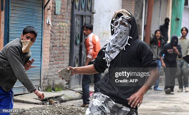 Kashmiri protestors clash with Indian police during a protest in Srinagar on April 23, 2010. Police detained activists including the chairman of...