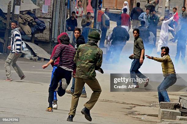 Kashmiri protestors clash with Indian police during a protest in Srinagar on April 23, 2010. Police detained activists including the chairman of...