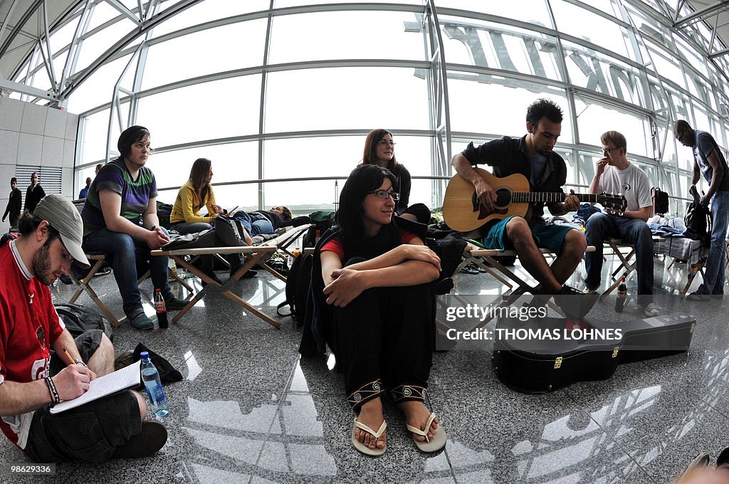 Air passengers wait at Frankfurt interna