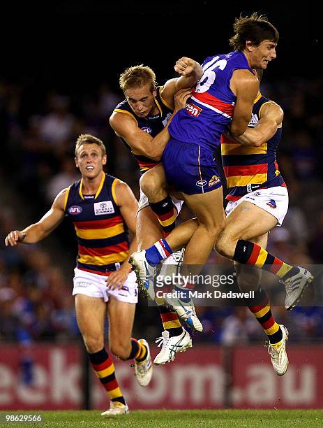 Ryan Griffin of the Bulldogs crashes into a pack during the round five AFL match between the Western Bulldogs and the Adelaide Crows at Etihad...