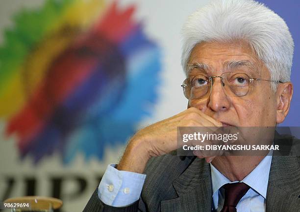 Chairman of Indian software company Wipro, Azim Premji gestures as he announces company financial results at the Wipro campus in Bangalore on April...