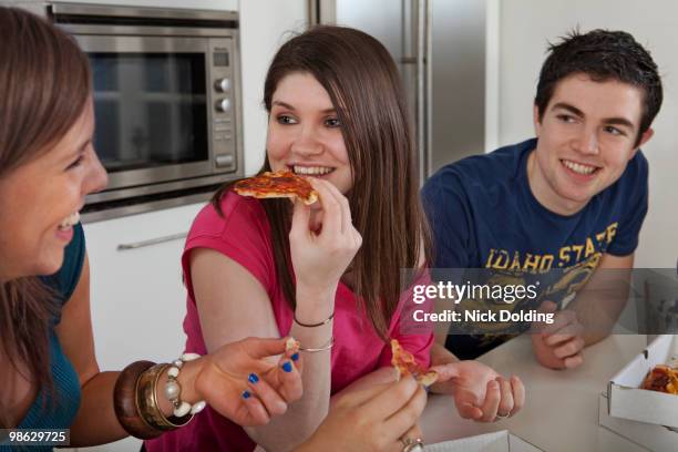 take out pizza 02 - newfamily stock pictures, royalty-free photos & images