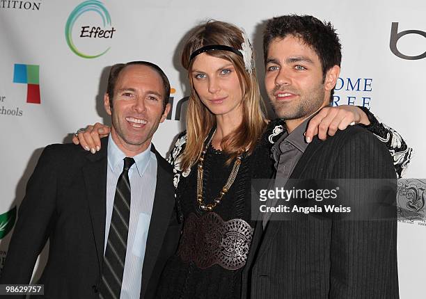 Producer Peter Glatzer, model Angela Lindvall and actor Adrian Grenier attend the 'Global Home Tree' Earth Day VIP reception hosted by James Cameron...