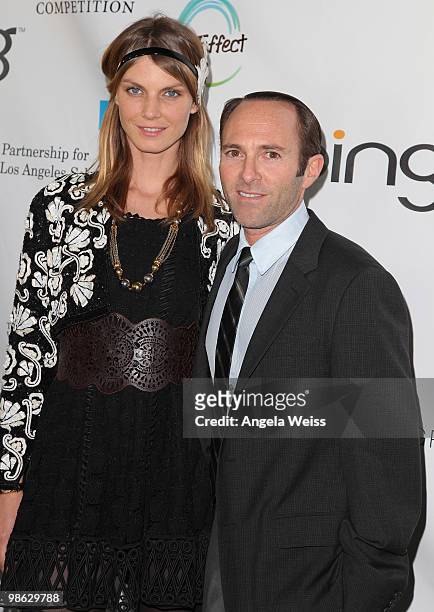 Model Angela Lindvall and producer Peter Glatzer attend the 'Global Home Tree' Earth Day VIP reception hosted by James Cameron at the JW Marriott Los...
