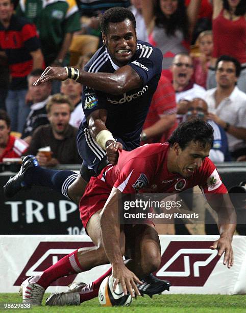 Will Chambers of the Reds scores a try during the round eleven Super 14 match between the Reds and the Stormers at Suncorp Stadium on April 23, 2010...