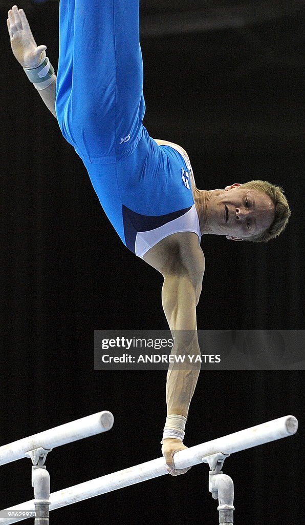 Llkka Kuusela of Finland dismounts from