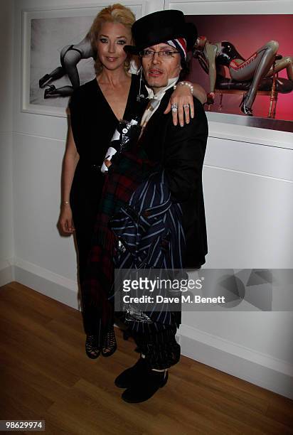 Tamara Beckwith, Adam Ant attend a viewing of photographs and art featuring work by Irish photographer Bob Carlos Clarke at the "Little Black...