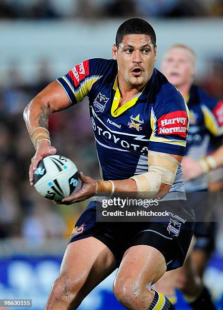 Willie Mason of the Cowboys passes the ball during the round seven NRL match between the North Queensland Cowboys and the Parramatta Eels at Dairy...