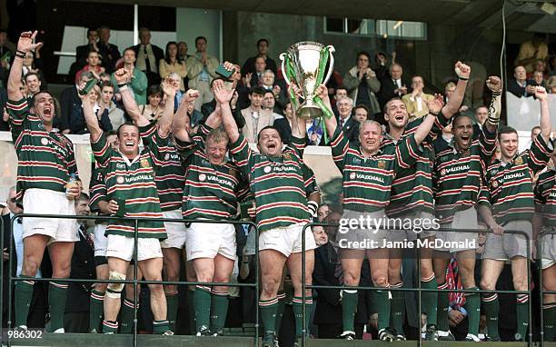 Darren Garforth and Neil Back of Leicester lift the Heineken Cup during the match between Stade Francais and Leicester Tigers in the Heineken Cup...