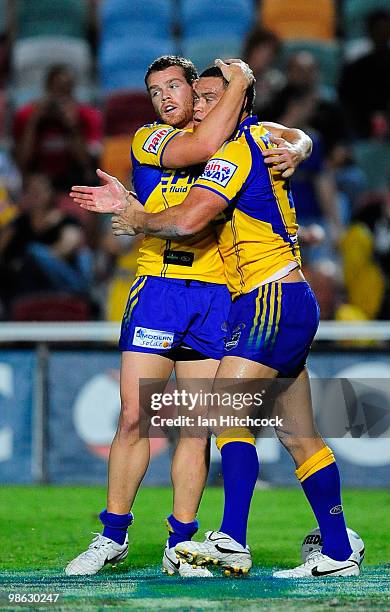 Timana Tahu of the Eels is congratulated by Matt Keating of the Eels after he scored a try during the round seven NRL match between the North...