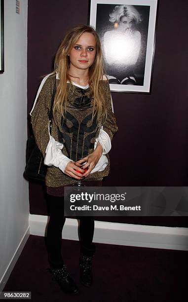 Scarlett Carlos Clarke attends a viewing of photographs and art featuring work by Irish photographer Bob Carlos Clarke at the "Little Black Gallery"...