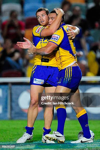 Timana Tahu of the Eels is congratulated by Matt Keating of the Eels after he scored a try during the round seven NRL match between the North...