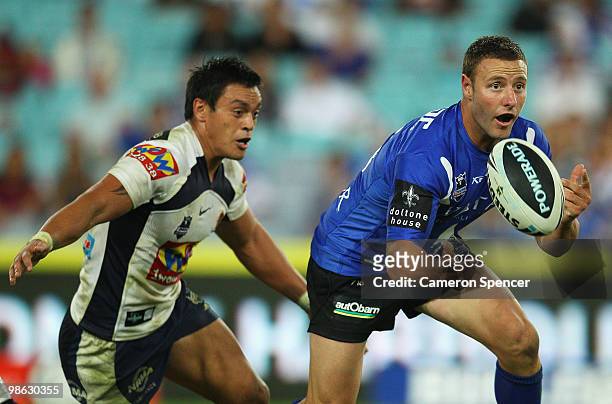 Blake Green of the Bulldogs passes the ball during the round seven NRL match between the Canterbury Bulldogs and the Brisbane Broncos at ANZ Stadium...