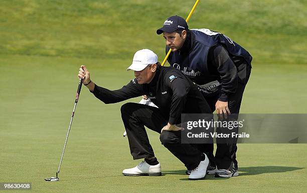 Marcus Both of Australia lines up a putt on the 10th green during the fog-delayed Round One of the Ballantine's Championship at Pinx Golf Club on...