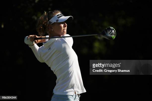 Jessica Korda watches her tee shot on the first hole during the first round of the 2018 KPMG PGA Championship at Kemper Lakes Golf Club on June 28,...