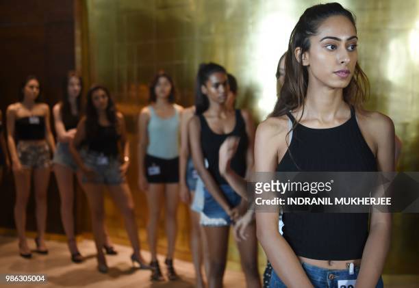 Models wait in line for the Lakmé Fashion Week Winter/Festive 2018 edition model auditions in Mumbai on June 28, 2018. - Lakmé Fashion Week, Indias...