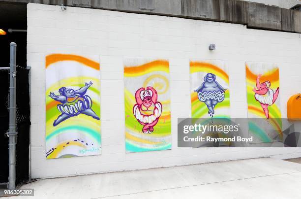 Artist Tyrue 'Slang' Jones' 'Ballerinas' canvas art pieces along the Chicago Riverwalk in Chicago, Illinois on June 23, 2018. MANDATORY MENTION OF...